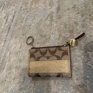 COACH gold stile Signature Coin Purse in like new condition